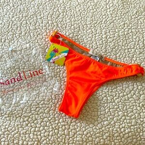 Bright orange bathing suit bottom from Brazil